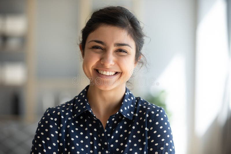 cheerful indian girl standing home office looking camera cheerful beautiful indian girl student professional standing 168424419